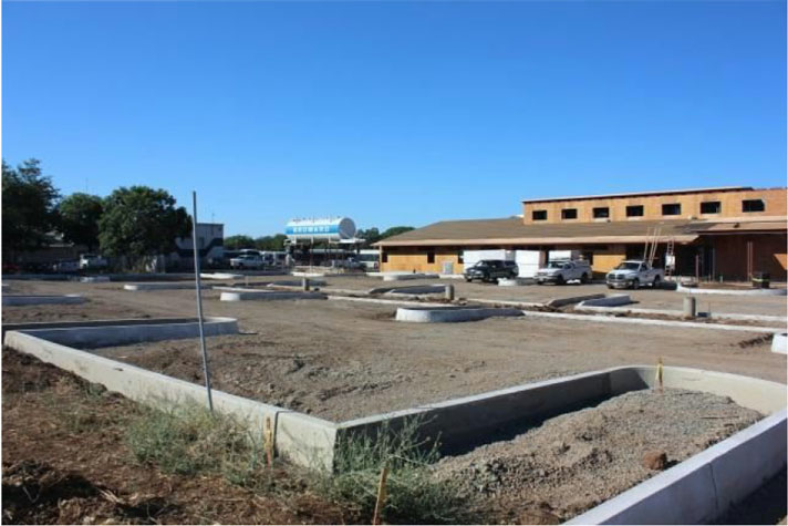 a parking lot next to a building